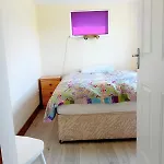 An Tigin, Gortadoo بيت للعطل